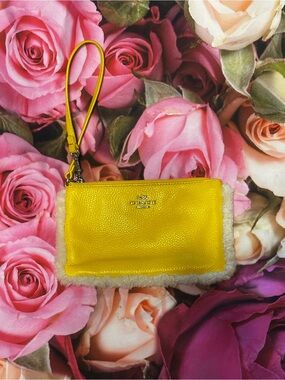 Coach Pebbled Leather Wristlet in Yellow and Shearling trim